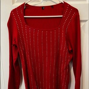 Right, lovely sweater with rhinestones in front, back plain